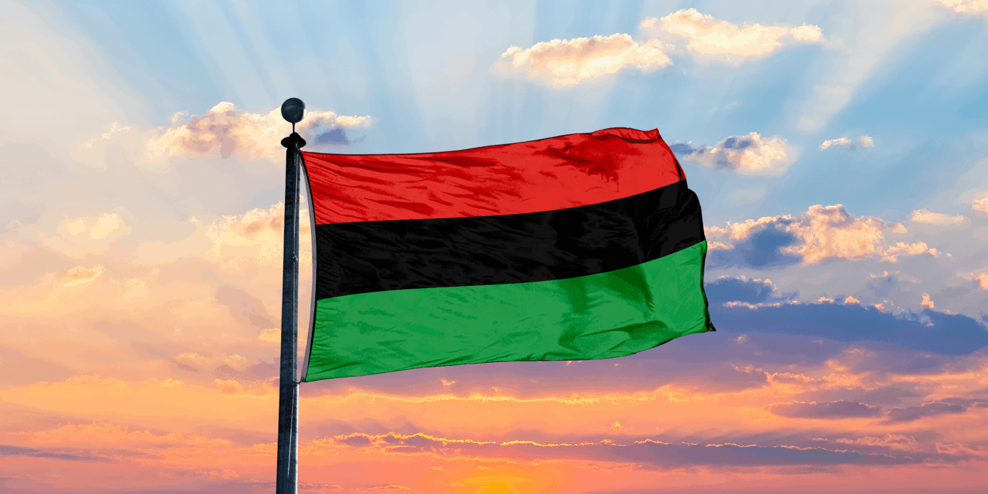 The Pan-African flag with red, black, and green horizontal stripes, symbolizing Black unity, liberation, and African heritage.