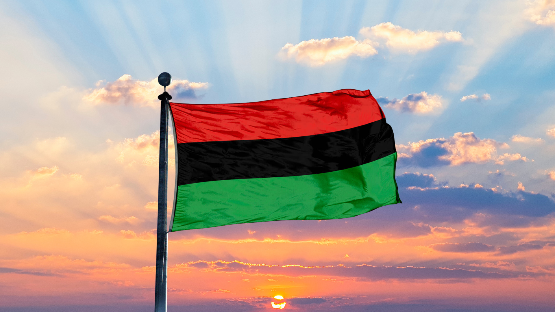 The Pan-African flag with red, black, and green horizontal stripes, symbolizing Black unity, liberation, and African heritage.